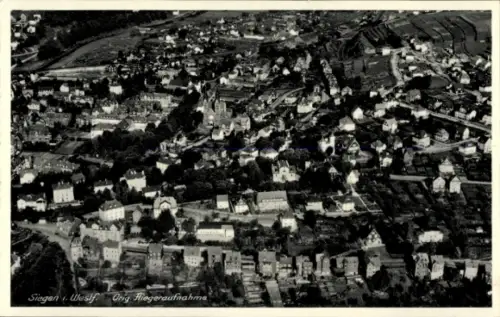 Ak Siegen in Westfalen, Luftaufnahme von  Häuser, Straßen, Landschaft