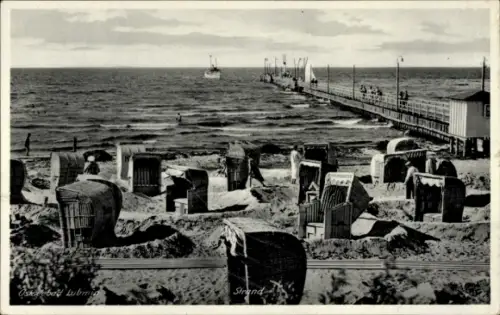 Ak Ostseebad Lubmin in Pommern, Strand, Strandkörbe, Meer, Boot, Pier