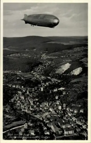 Ak Sonnenberg Wiesbaden in Hessen, Zeppelin über der Stadt