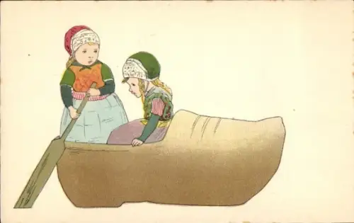 Ak Kinder in einem Holzschuh, Trachten Niederlande