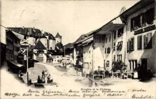 Ak Gruyères Kanton Freiburg Schweiz, Gruyère et le Château,  Gebäude, Straße, 