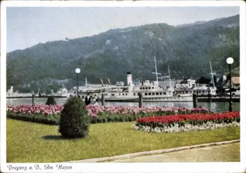 Ak Bregenz am Bodensee Vorarlberg, Bregenz a. B., Am Hafen, Schiffe, Blumenbeete, Berge