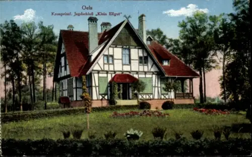Ak Oleśnica Oels Schlesien, Jagdschloss Klein Ellgut,  umgeben von Bäumen und Blumenbeeten