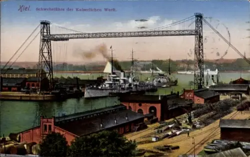 Ak Kiel in Schleswig Holstein, Schwebefähre der Kaiserlichen Werft, Kriegsschiff