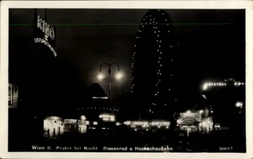 Ak Wien 1 Innere Stadt, KINO, Riesenrad, Hochschaubahn, Nachtaufnahme, Prater