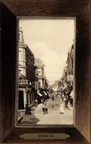 Ak Évreux Eure, Straße in  Menschen, Hunde, Geschäfte,  