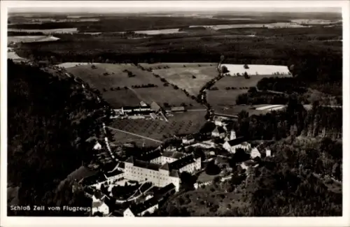Ak Zeil am Main Unterfranken, Luftaufnahme von Schloss  Landwirtschaftsflächen, Wälder