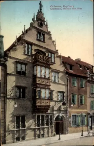 Ak Colmar Kolmar Elsass Haut Rhin,  Kopfhaus, Maison des têtes,  Fassade, bunte Fenster