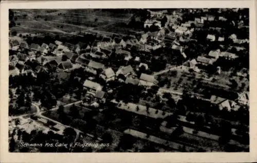 Ak Schwann Staubenhardt im Schwarzwald, Luftaufnahme von  Häuser, Bäume, Flugzeug