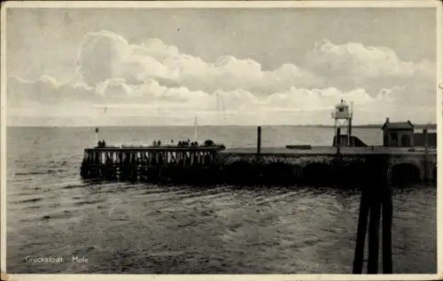 Ak Glückstadt an der Elbe,  Mole, Pier, Wasser, Wolken