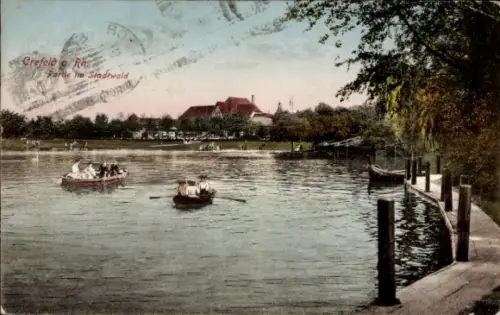 Ak Krefeld am Niederrhein, Crefeld Rh, Stadtwald, Boote auf dem Wasser, Menschen am Ufer