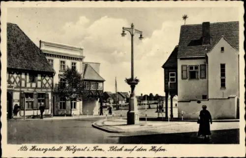 Ak Wolgast in Mecklenburg Vorpommern, Hafen, Straßenpartie