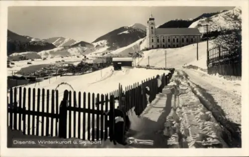 Ak Disentis Kt. Graubünden, Schneebedeckte Landschaft, Berge, Kirche, Zäune, Winterkurort, Skispo