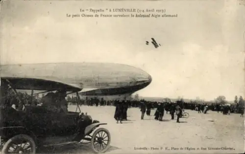 Ak Lunéville Lothringen Meurthe et Moselle, Dirigéable allemand, Zeppelin, Avion francais