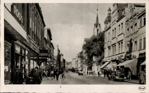Ak Cottbus in der Niederlausitz,  Spremberger Straße, DOGO, Menschen, Autos, Geschäfte