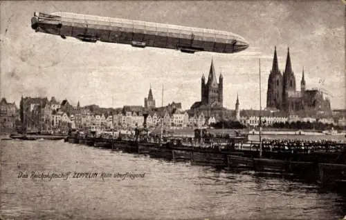 Ak Köln am Rhein, Reichsluftschiff Zeppelin über der Stadt, Dom, Schiffsbrücke