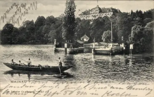 Ak Insel Mainau im Bodensee, Boot auf dem Wasser, Bäume, Gebäude im Hintergrund, Personen im Boot