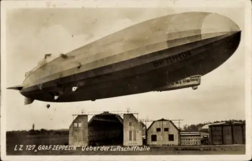 Ak Friedrichshafen, Luftschiff LZ 127 Graf Zeppelin über der Luftschiffhalle