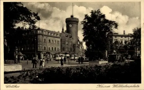 Ak Cottbus in der Niederlausitz,  Kaiser Wilhelmplatz,  Gebäude, Menschen, Straßenbahn