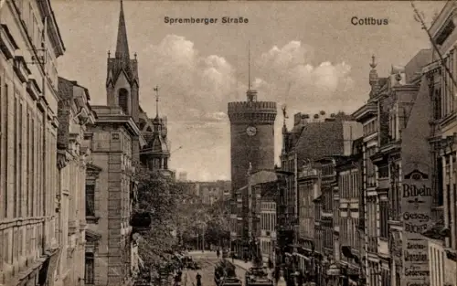 Ak Cottbus in der Niederlausitz, Spremberger Straße,  Uhrturm, Geschäfte, Straßenansicht