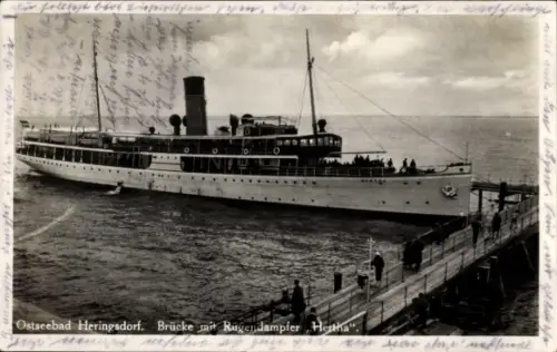 Ak Ostseebad Heringsdorf auf Usedom, Rügendampfer Hertha an der Seebrücke