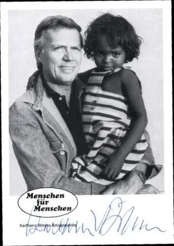 Ak Schauspieler Karlheinz Böhm, Portrait mit Kleinkind