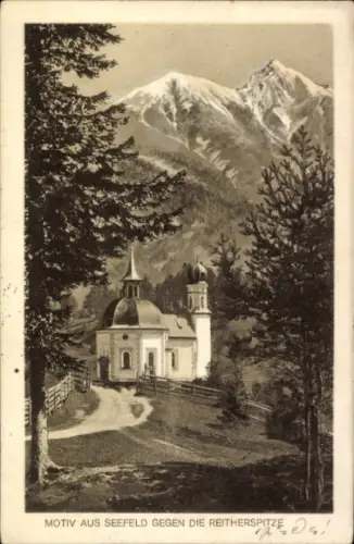 Ak Seefeld in Tirol, Motiv gegen die Reitherspitze,  Kirche