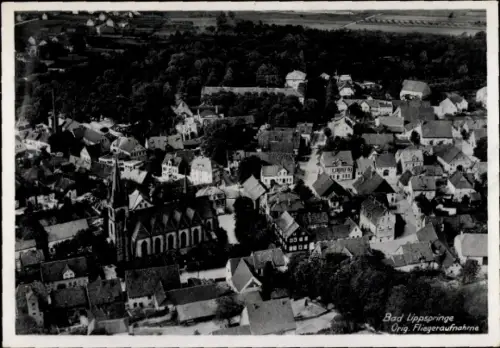 Ak Bad Lippspringe in Westfalen, Luftaufnahme von  viele Häuser, Kirche sichtbar