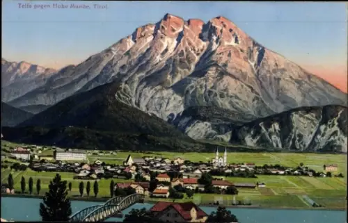 Ak Telfs in Tirol, Berglandschaft, Hohe Munde,  Fluss, Häuser, Kirche