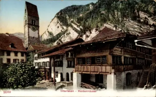 Ak Interlaken Kanton Bern Schweiz,  Heidenhäuser, Uhrturm, Berge