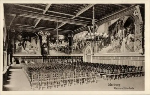 Ak Marburg an der Lahn, Universitäts-Aula,  leere Stuhlreihen, Wandmalereien