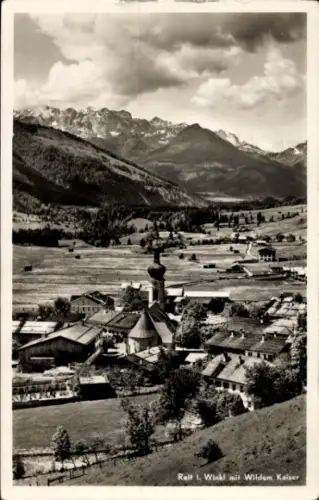 Ak Reit im Winkl Oberbayern, Berglandschaft, Ort mit Kirche, Bauernhäuser, Wilden Kaiser