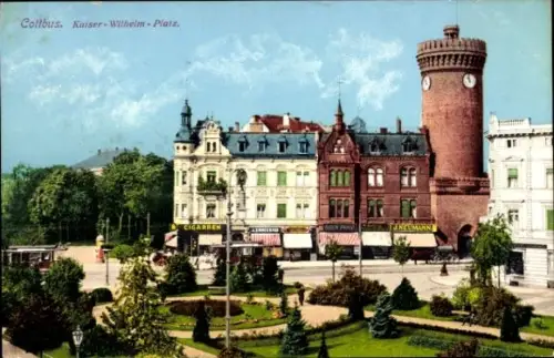 Ak Cottbus in der Niederlausitz,  Kaiser-Wilhelm-Platz, Gebäude, Cigarre Janeumann