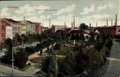 Ak Cottbus in der Niederlausitz,  Kaiser Wilhelm-Platz, Parkanlage, Bäume, Gebäude