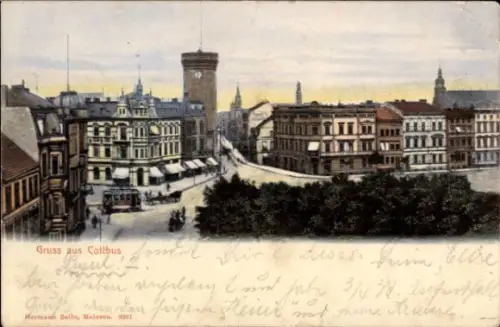 Ak Cottbus in der Niederlausitz, Stadtansicht  Uhrturm,  Gebäude, Straßenbahn