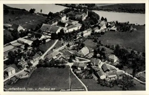 Ak Jettenbach am Inn Oberbayern, Luftaufnahme von  Obb., Fluss, Gebäude, Straßen