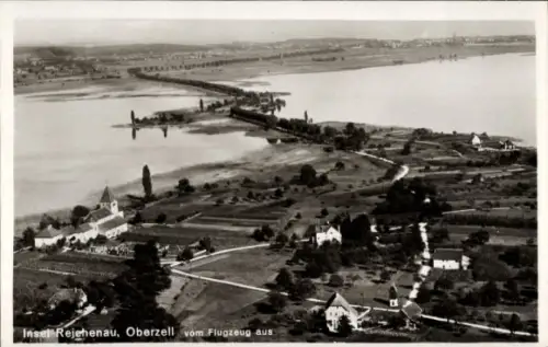 Ak Oberzell Insel Reichenau im Bodensee, Luftbild von  vom Flugzeug aus
