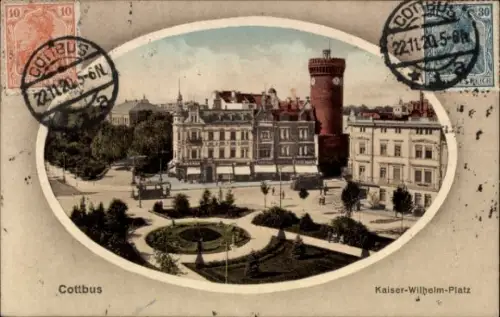 Ak Cottbus in der Niederlausitz,  Kaiser-Wilhelm-Platz,  Gebäude, Straßenbahn, Parkanlage