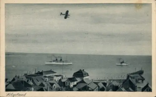 Ak Nordseeinsel Helgoland, Luftaufnahme von  Flugzeug, Schiffe, Häuser