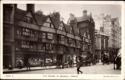 Ak Holborn Camden London England, Alte Häuser in Holborn,  Schwarz-Weiß-Foto, Straßenansicht, Men