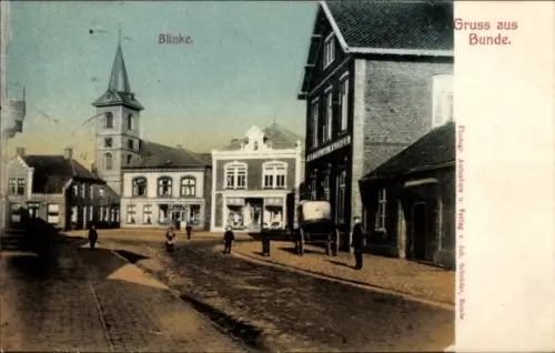 Ak Blinke Bunde in Niedersachsen, Straßenpartie mit Blick zur Kirche, Geschäfte, Hotel zur Blinke