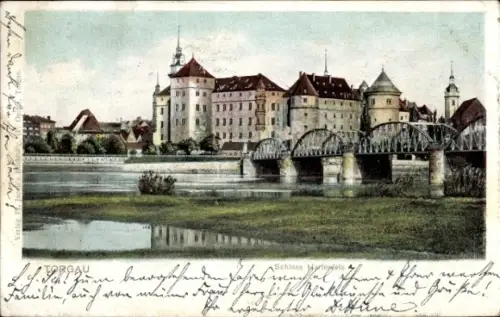 Ak Torgau an der Elbe, Schloss Hartenfels, Fluss, Brücke, Landschaft, 