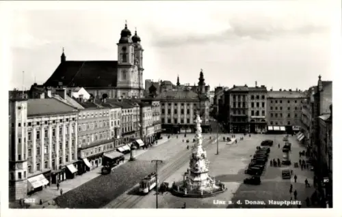 Ak Linz an der Donau Oberösterreich,  Hauptplatz, Brunnen, Straßenbahn,  Gebäude