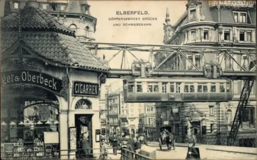 Ak Elberfeld Wuppertal,  Doppersberger Brücke, Schwebebahn, Cigarre, Personen, Straßenbahn