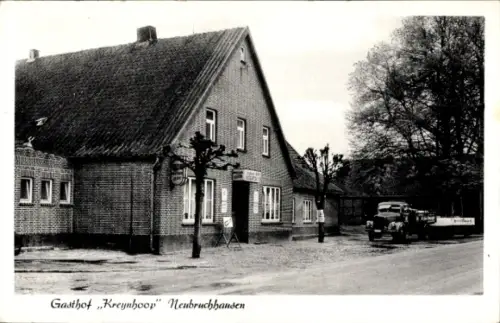 Ak Neubruchhausen Bassum in Niedersachsen, Gasthof Kreynhoop,  Gebäude, Auto, Bäume