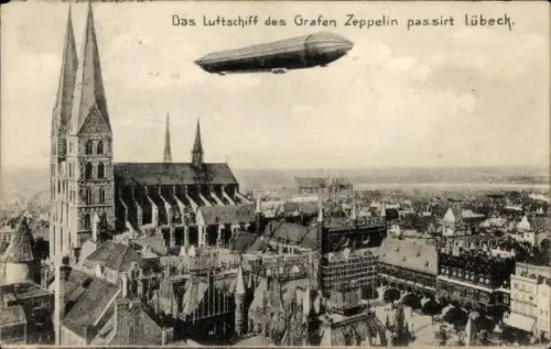 Ak Hansestadt Lübeck, Gesamtansicht, Luftschiff des Grafen Zeppelin