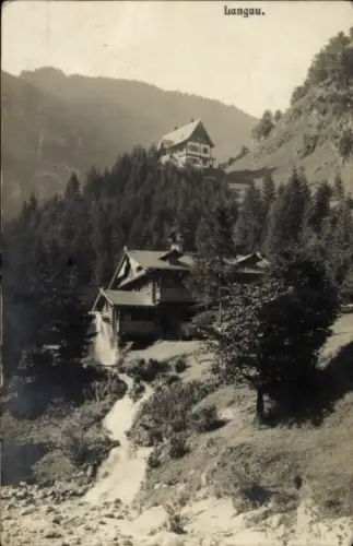 Ak Langau bei Geras Niederösterreich,  Berglandschaft, Häuser, Wald, Wasserfall