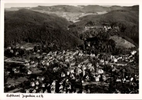 Ak Jugenheim an der Bergstraße Hessen, Luftaufnahme von  viele Häuser, grüne Hügel im Hintergrund