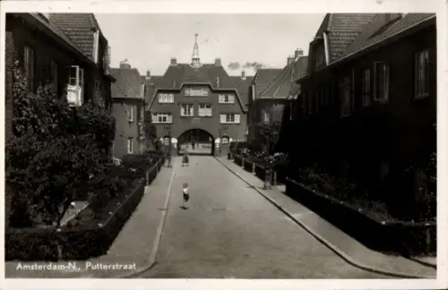 Ak Amsterdam Nordholland Niederlande, Putterstraße, Torbogen