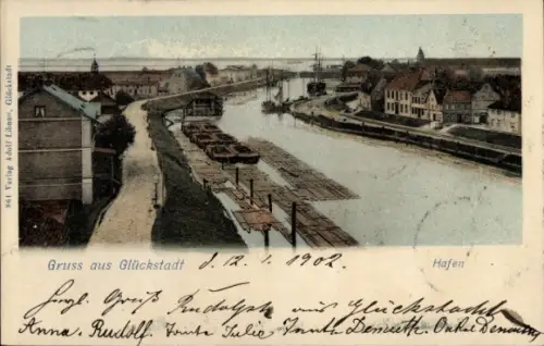 Ak Glückstadt an der Elbe, Hafenansicht, Schiffe, Häuser, Wasserstraße,  1902